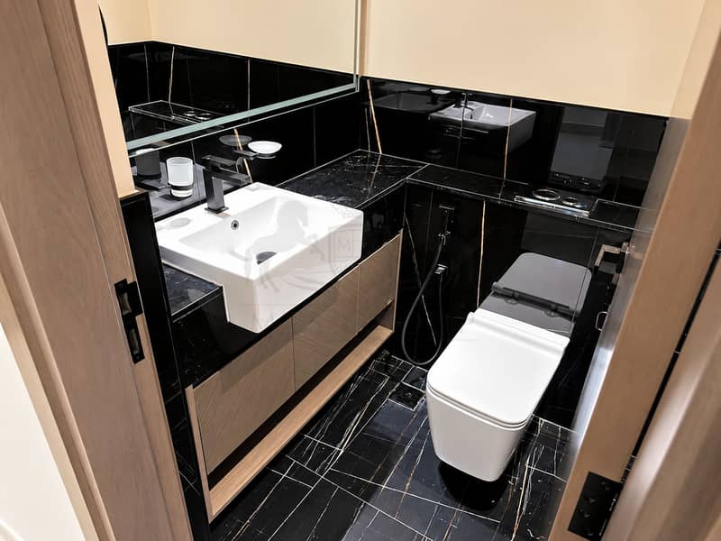 14 Luxurious Black Marble Powder Room. png