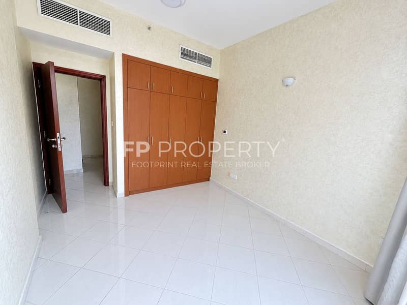 5 Empty Beige Bedroom with Built-In Wardrobe. png