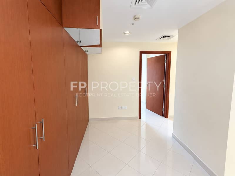7 Bright Wood-Trimmed Hallway with Built-Ins. png