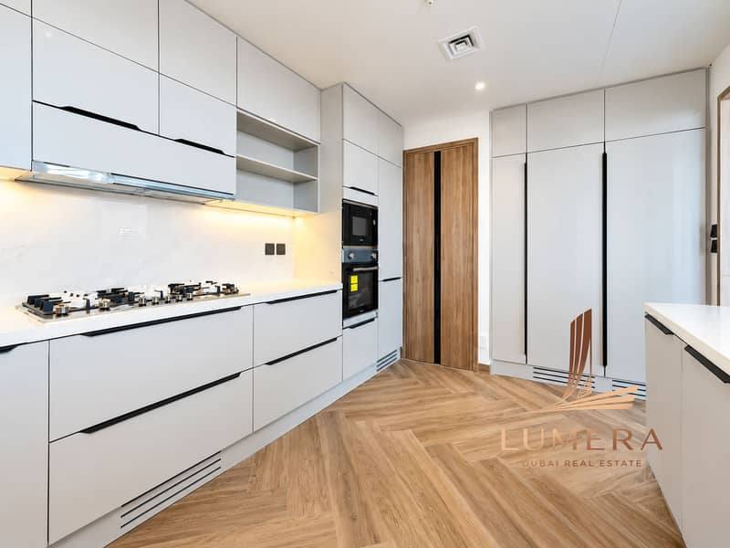 4 Modern Minimalist Kitchen with Herringbone Flooring. png