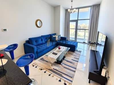 1 Camera Appartamento in affitto a Jumeirah Village Circle (JVC), Dubai - Modern Blue Living Room with Balcony Views. png 1 Camera Appartamento in affitto a Jumeirah Village Circle (JVC), Dubai - Modern Blue Living Room with Balcony Views. png