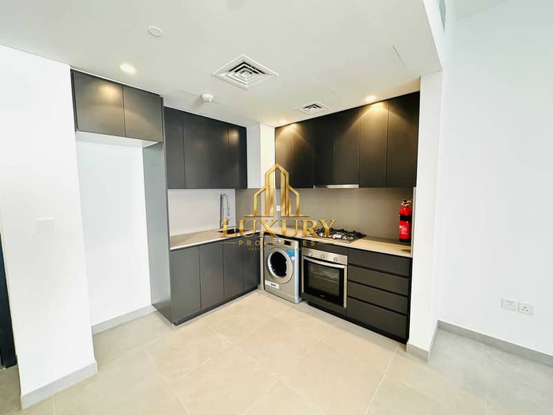 10 Brand-New 1-Bedroom Apartment in Sukoon, Aljada | Spacious Balcony & Pool View