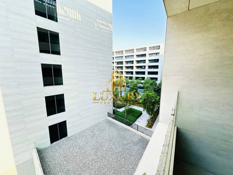 14 Brand-New 1-Bedroom Apartment in Sukoon, Aljada | Spacious Balcony & Pool View