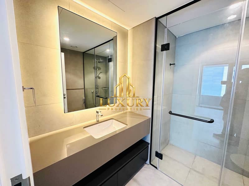 15 Brand-New 1-Bedroom Apartment in Sukoon, Aljada | Spacious Balcony & Pool View