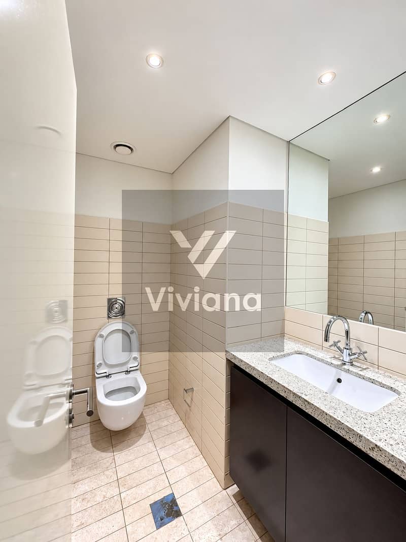 11 Bright Modern Office Restroom. png