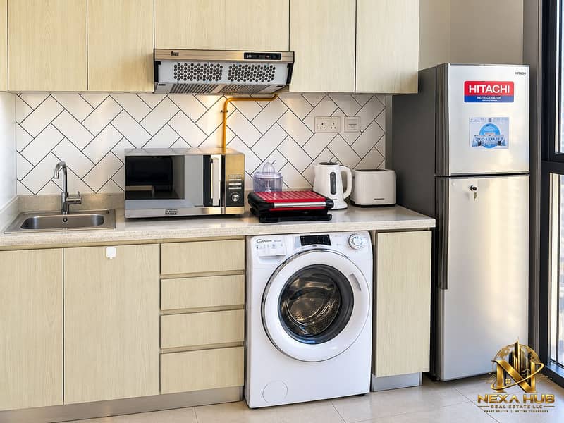 7 Modern Compact Kitchen with Stainless Appliances. png