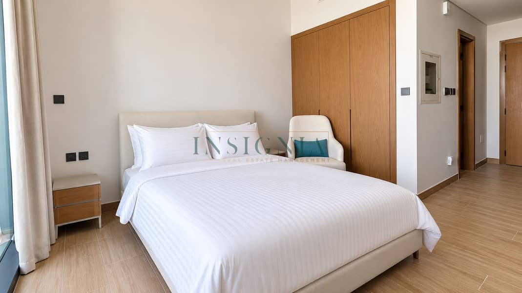 3 Modern Neutral Bedroom with Teal Accent. png