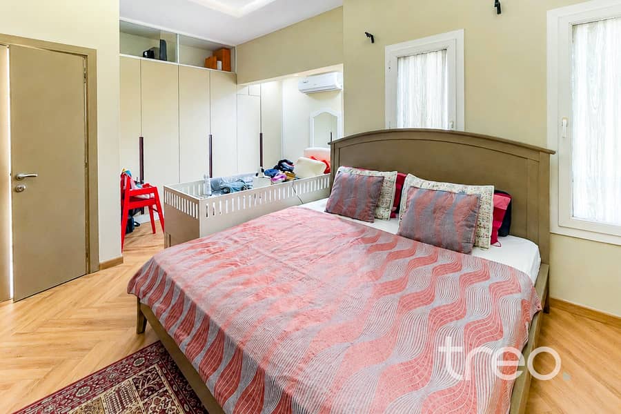 7 Brightened Taupe Bedroom with Cot. jpg