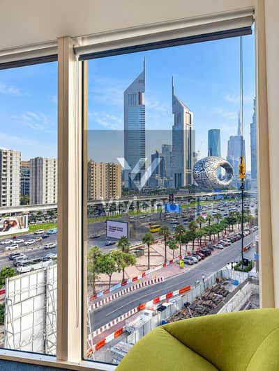 مکتب  للايجار في شارع الشيخ زايد، دبي - Dubai Skyline Through Office Window. png