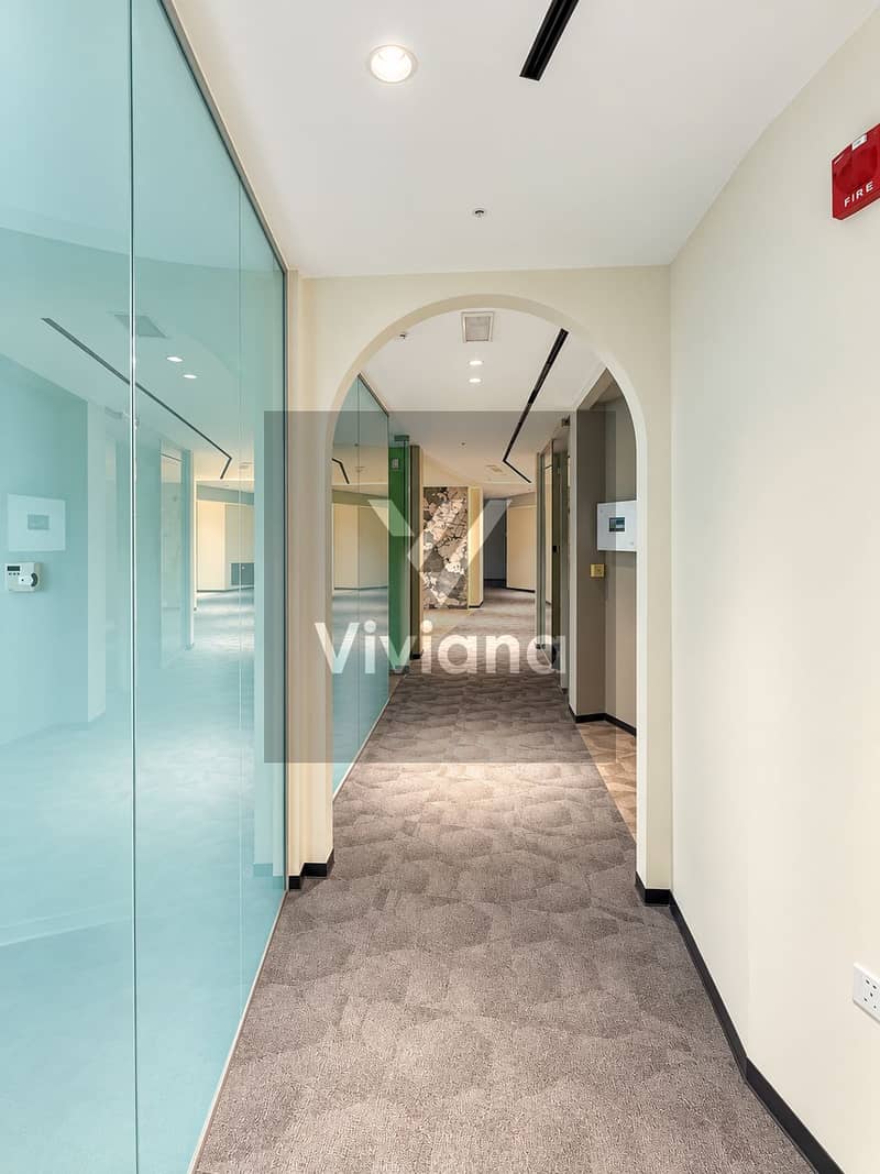 26 Modern Office Hallway with Arched View. png