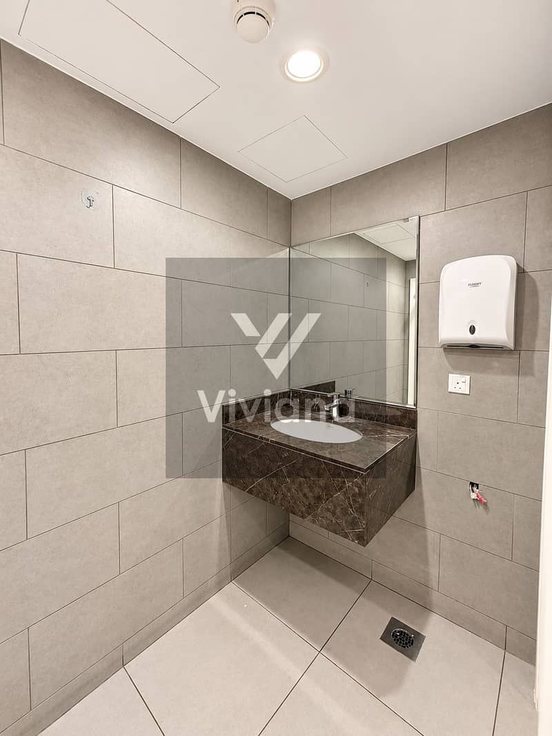 35 Modern Tiled Restroom Sink Corner. png