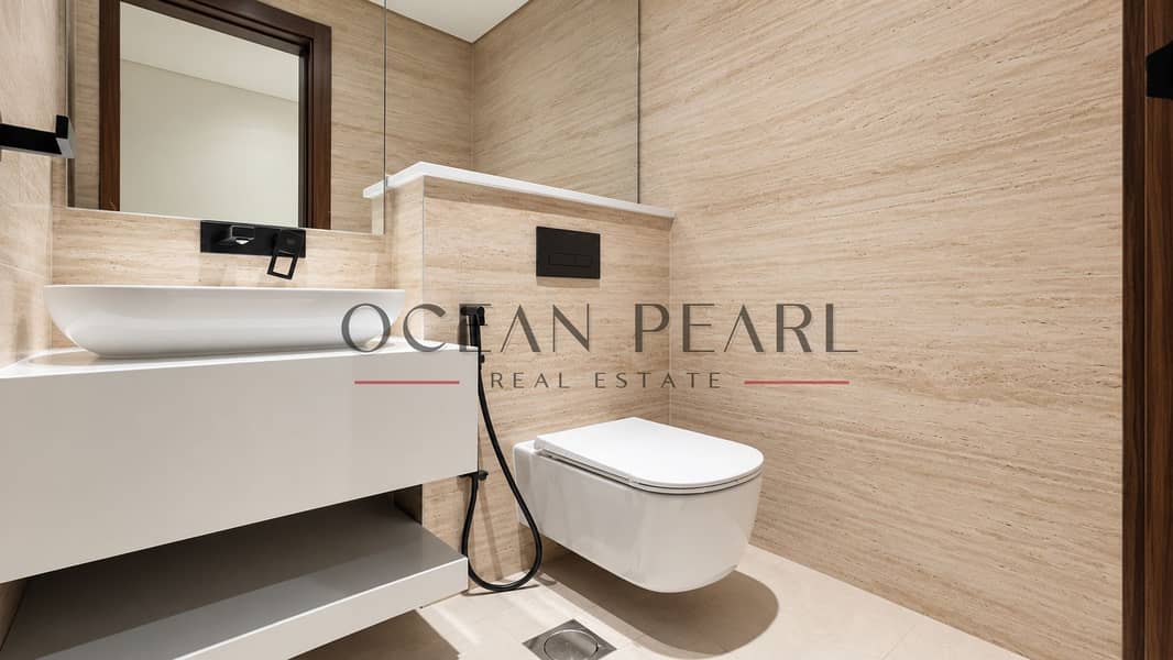 11 Bright neutral travertine powder room-16. png