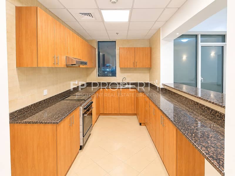 2 Bright U-Shaped Kitchen Interior. png