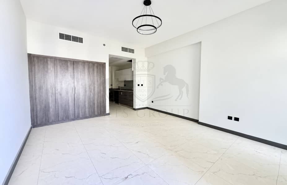 4 Minimalist Apartment with Modern Kitchen Alcove. png