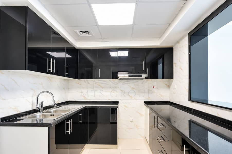 12 Modern Glossy Black Kitchen Interior. png