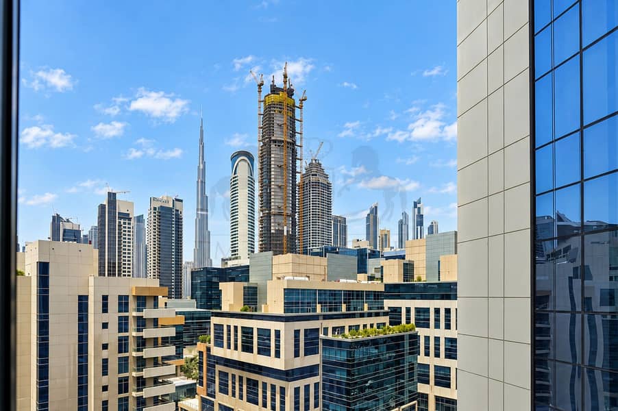 13 Dubai Skyline with Burj Khalifa and Cranes. png
