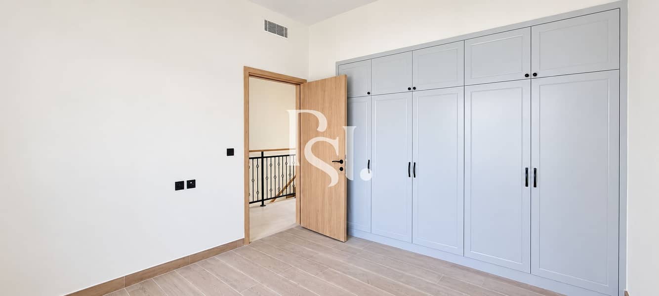 9 Bright Minimal Bedroom with Built-in Wardrobe. png