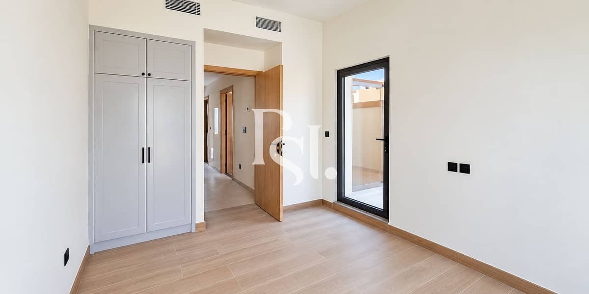 10 Bright Minimalist Room with Balcony Doors. png