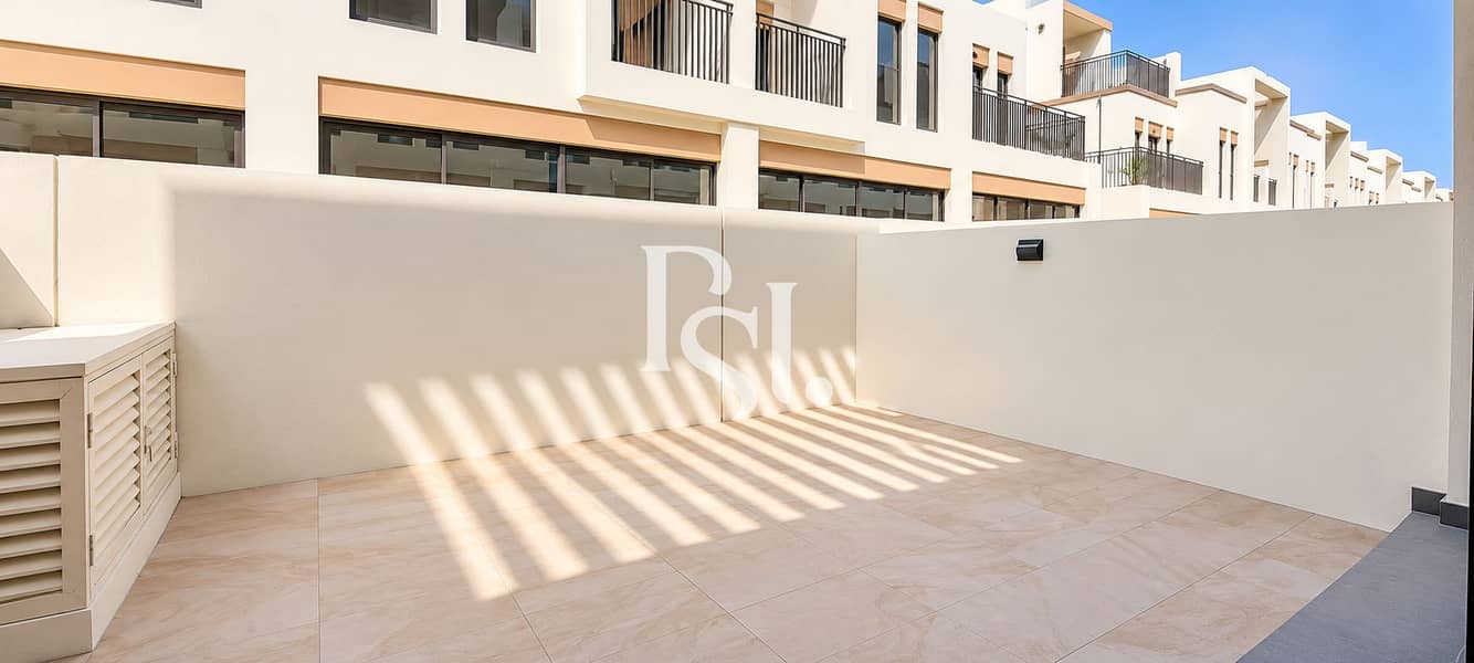 23 Modern Sunlit Townhouse Courtyard. png