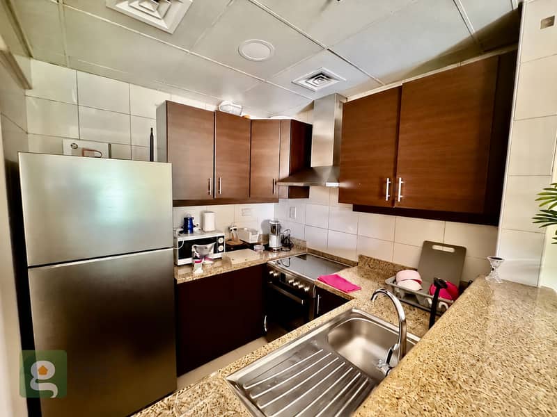 5 Warm Kitchen With Granite Counters-4. png