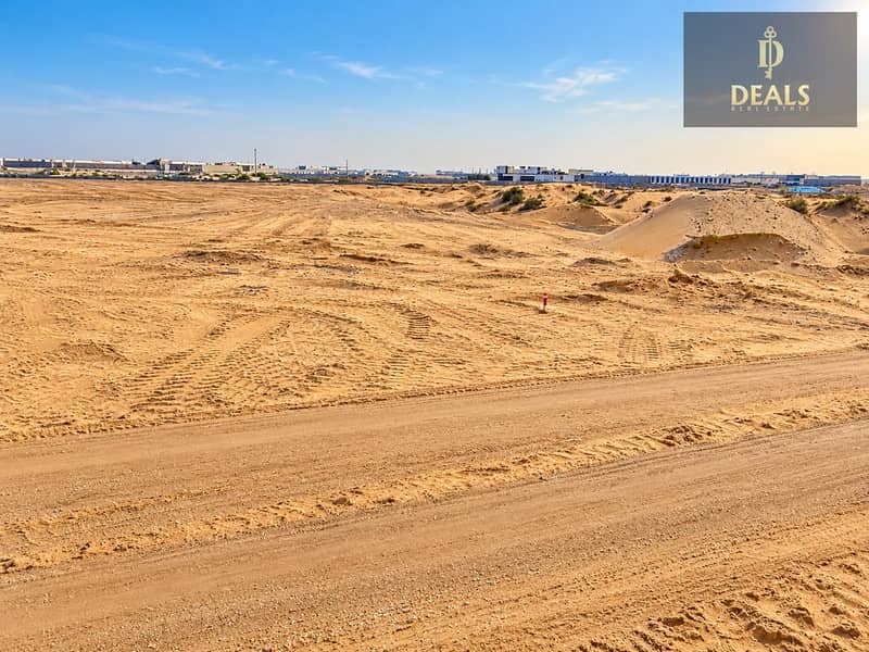 3 Desert Plot Development Under Blue Skies. png