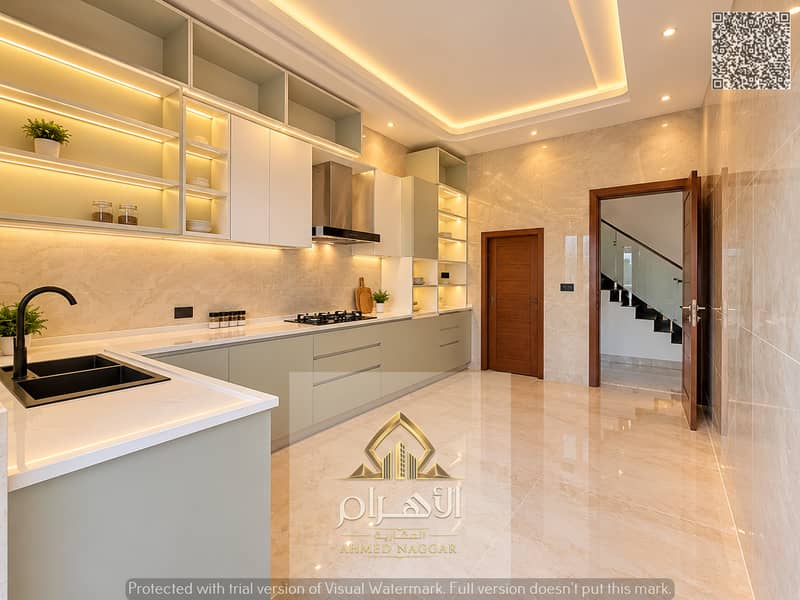 4 مطبخ عصري فاخر بإضاءة دافئة. jpg
