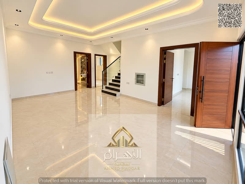 5 مدخل عصري فاخر بإضاءة دافئة. jpg