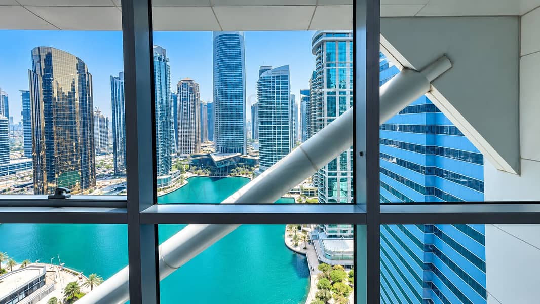 13 Waterfront Skyline Through Modern Windows. png