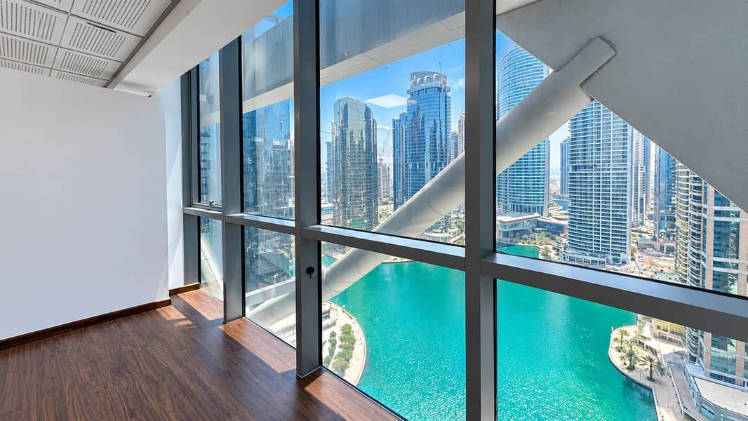 14 Modern Office Overlooking Waterfront Skyline. png