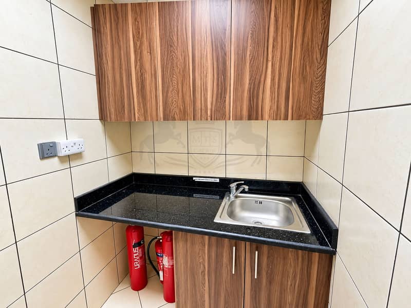 15 Modern Walnut Kitchenette with Granite Sink 彩神争霸app. png