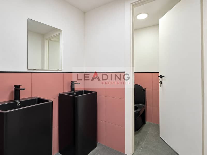 11 Showroom-Fresh Twin Basin Bathroom. png