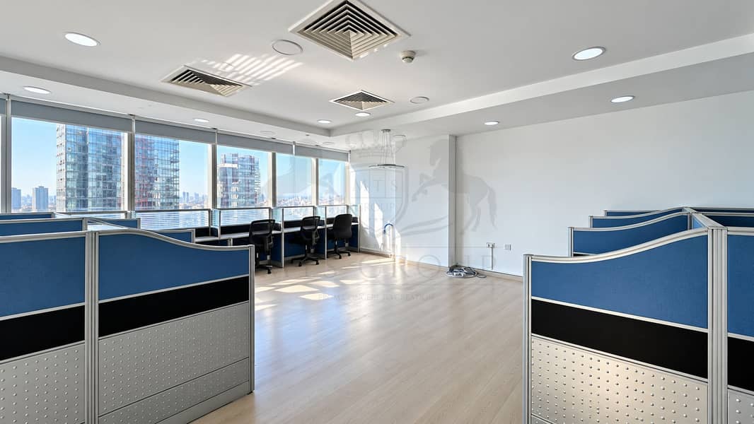 4 Modern Blue Cubicle Office with City Views. png