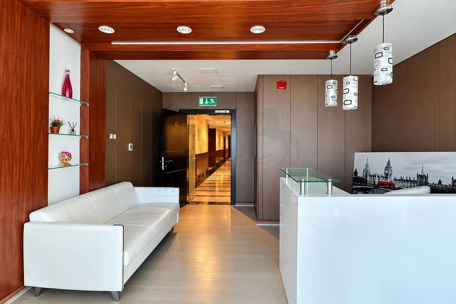 13 Modern Reception Lobby with Warm Wood Accents. png