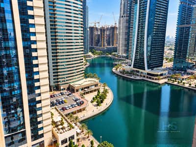 朱美拉湖塔 (JLT)， 迪拜 1 卧室公寓待租 - Sunlit High-Rise Marina Panorama. png
