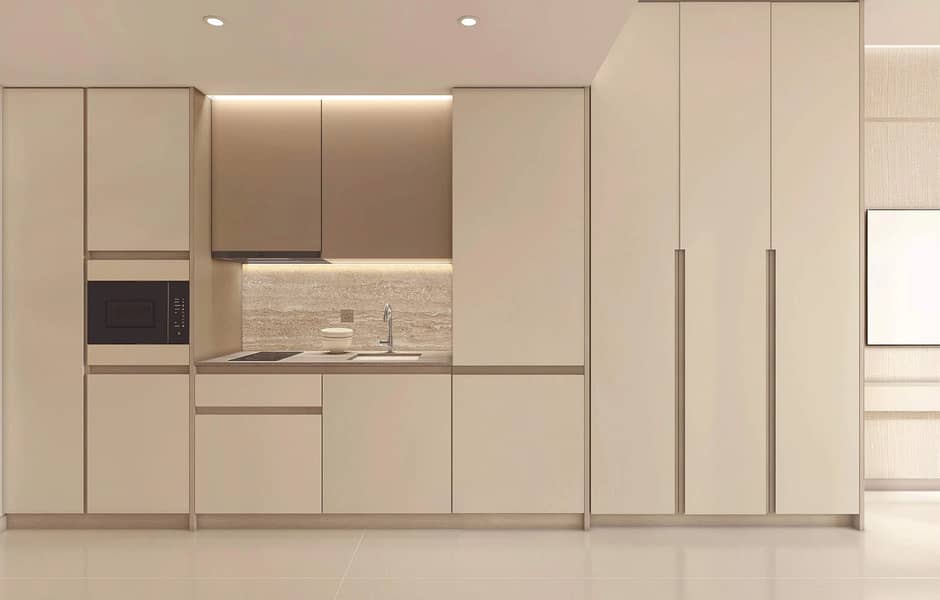 10 theviews-04studio-unit-01entrance-kitchen. webp