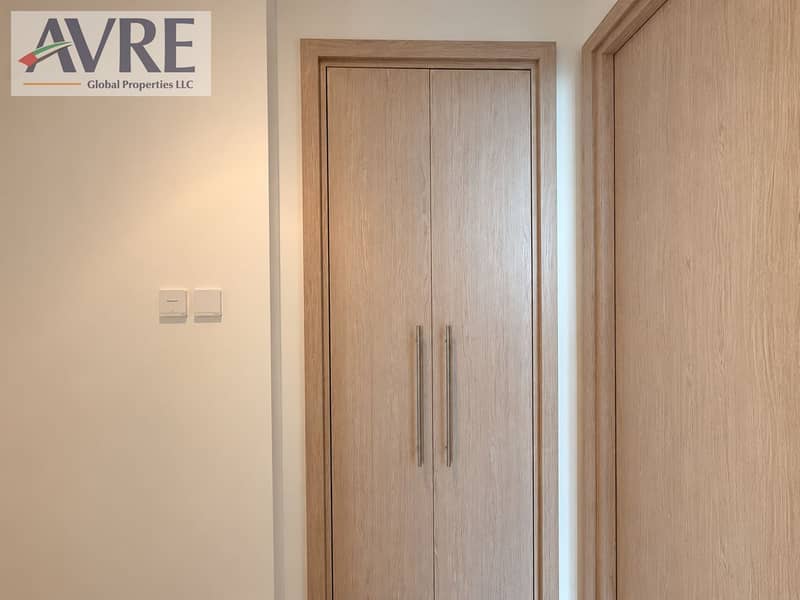 12 Minimal Oak Hallway with Closed Doors. png