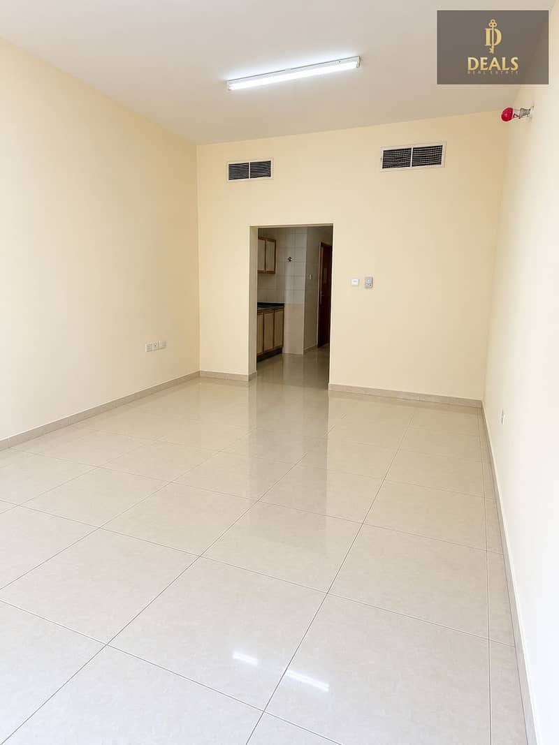 2 Clean Empty Cream-Tiled Interior. png