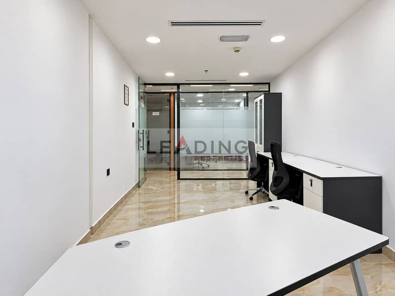 9 Bright glass-partitioned office interior. png