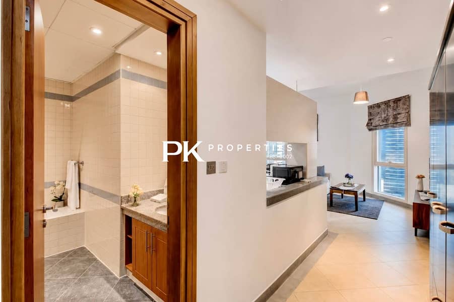 13 Dubai Studio: City Views, Pool & Gym Access