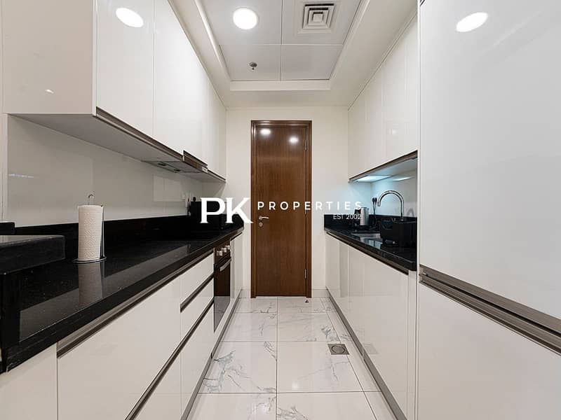 10 Noora Tower 1 BR: Canal Views & Pool Access