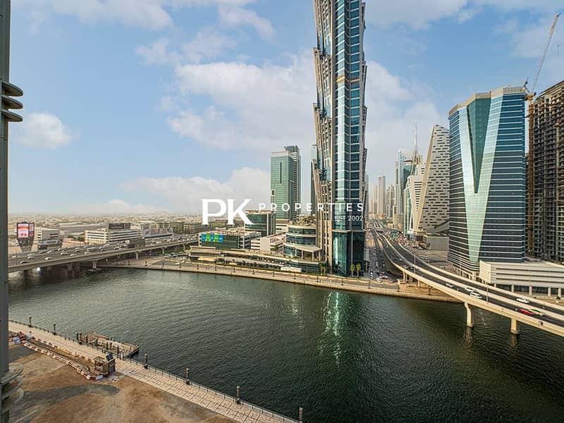 21 Noora Tower 1 BR: Canal Views & Pool Access