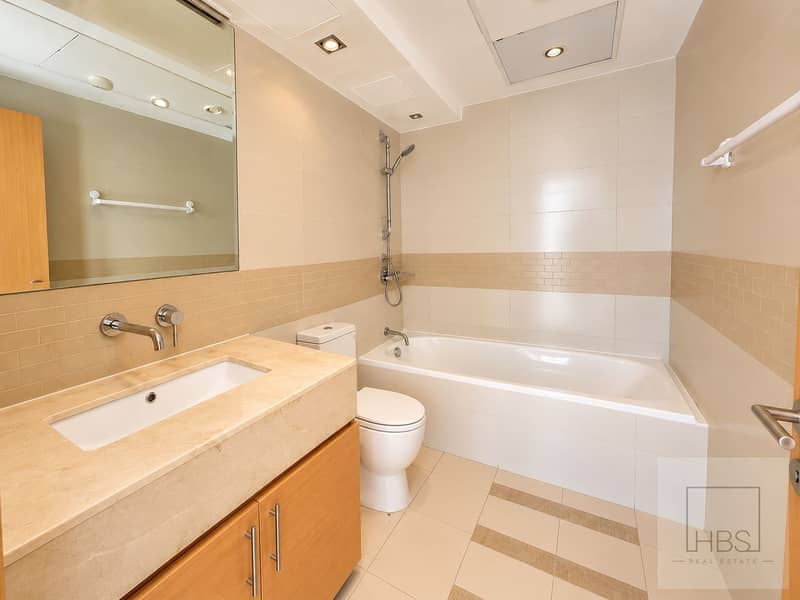7 Modern Beige Bathroom with Closed Toilet. png