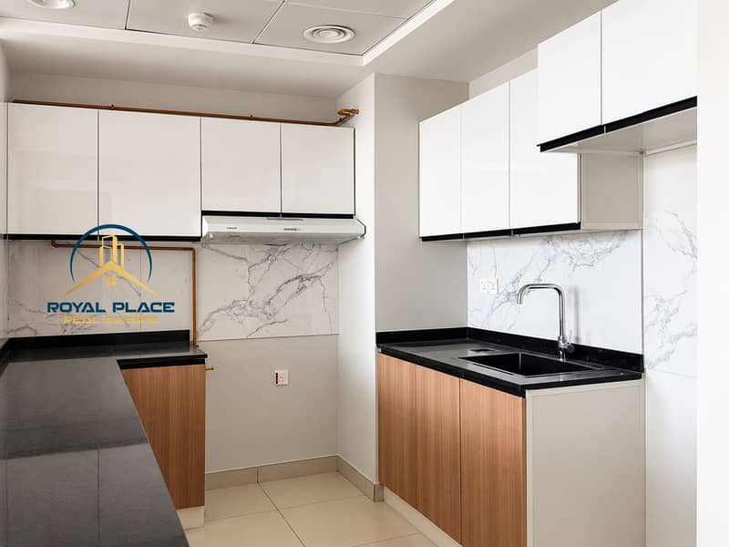 6 Modern Marble-Backed Galley Kitchen. png