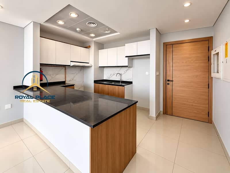 8 Modern Marble and Oak Kitchen. png