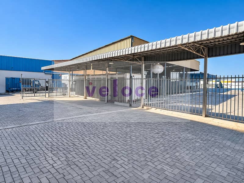 9 Sunlit Industrial Canopy and Fenced Yard. png