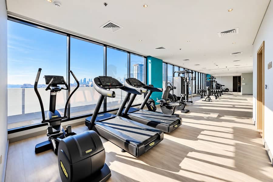 9 Sunlit Modern Gym with City Views. png