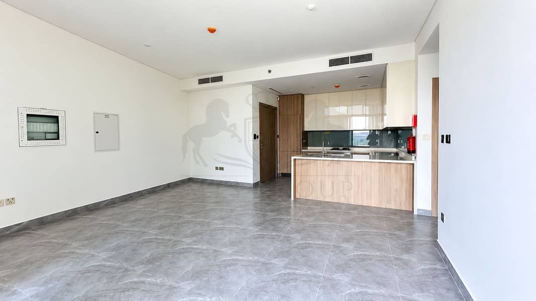 3 Modern Empty Apartment with Open Kitchen. png
