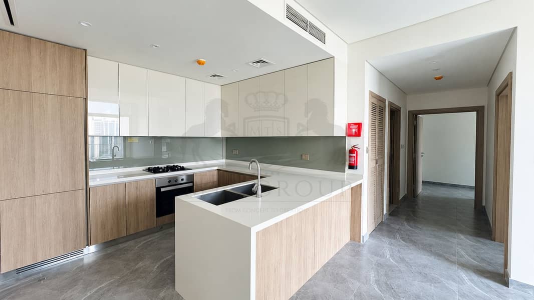 5 Modern Minimalist Kitchen with Island and Hallway. png