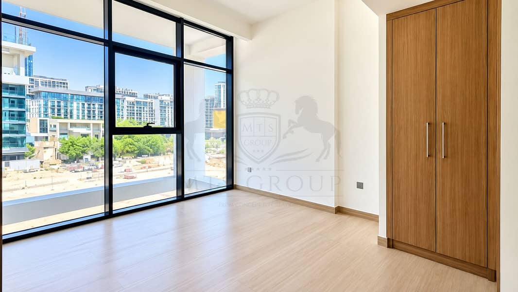 5 Sunlit Minimalist Room with City View. png