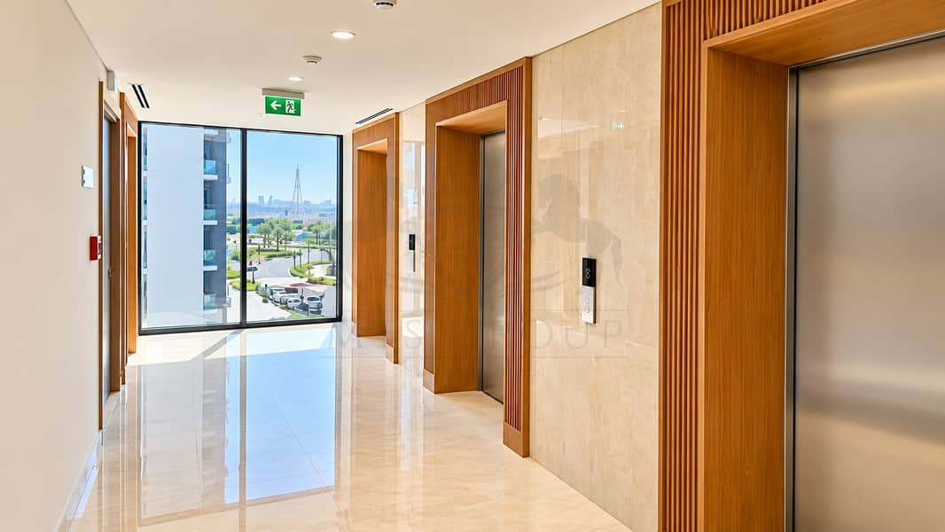 12 Modern Marble Elevator Lobby with City Views. png